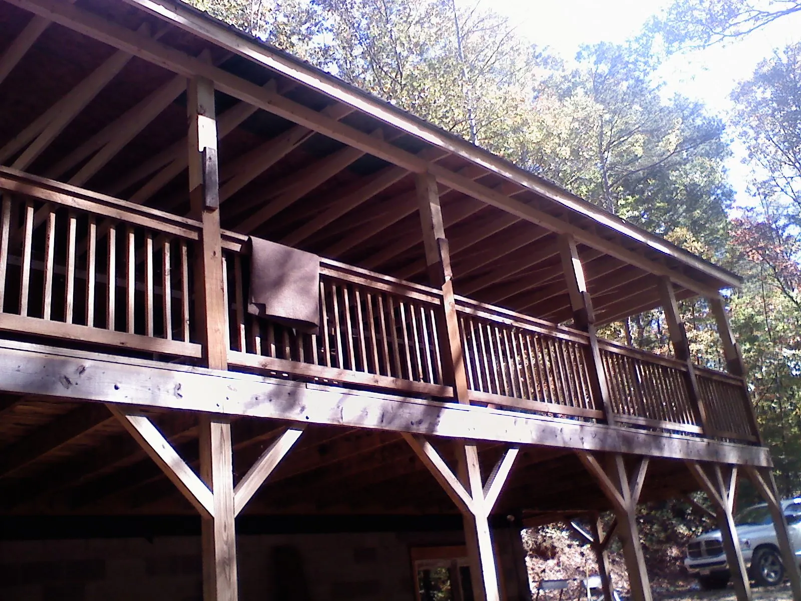 Timber framing under a new elevated porch and deck — Roof Leak Repair in Sheyenne by Roofing Brothers